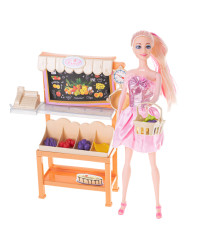 Salesgirl doll on shopping spree at supermarket vegetable store