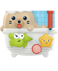 A bath toy , a seal in a bathtub
